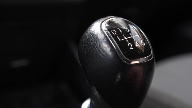Driver Changing Gears with Manual Transmission Gear Stick