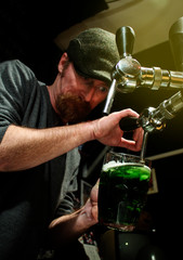 Pouring the green beer