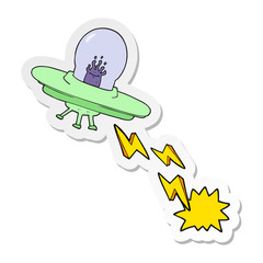 sticker of a cartoon flying saucer