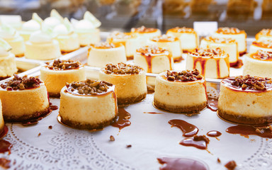 Vanilla Cheesecake pie desserts with caramel and walnut topping