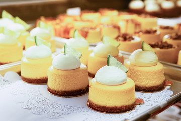 Vanilla Cheesecake pie desserts with cream slice of lime