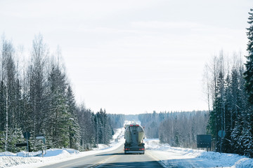 Truck in Snowy winter driveway of Finland