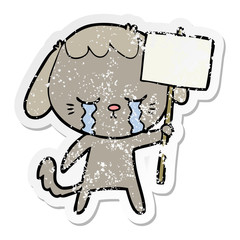 distressed sticker of a cartoon dog crying