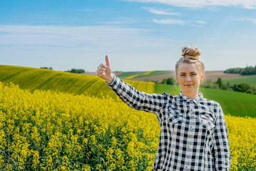 Farmer in rape field