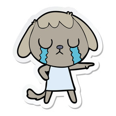 sticker of a cute cartoon dog crying