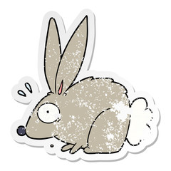 distressed sticker of a cartoon frightened rabbit