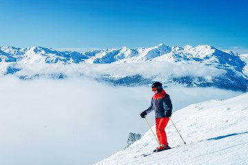 Fototapeta na wymiar Man Skier in Zillertal mountains Arena ski resort Zillertal
