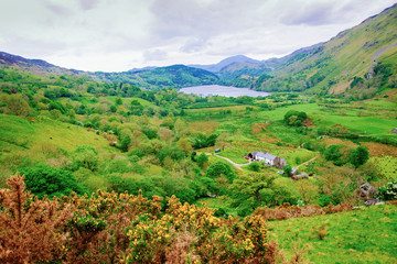 Fototapeta na wymiar Landscape with mountains and lakes in Snowdonia National Park UK
