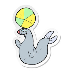 sticker of a cartoon seal balancing ball