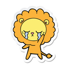 sticker of a crying cartoon lion