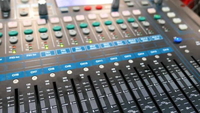 Sound Mixer Console With Audio Channel Faders Close-Up