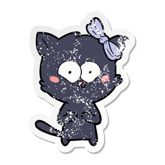 distressed sticker of a cartoon cat