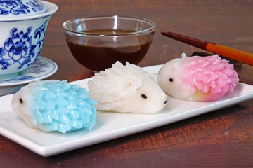 Dumpling : Cute porcupine shaped dumpling, delicious traditional asian food.(Chinese dumpings or Jiaozi) / Dim Sum : Colorful Porcupine shaped Dim Sum.