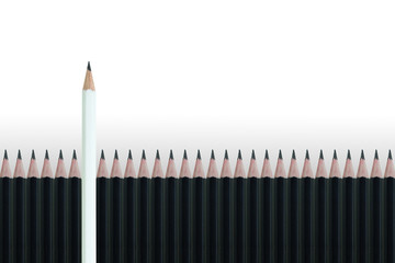 Business Leadership Concept : White pencil standing out from row of many black pencils on gray background.