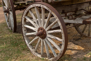 Fototapeta na wymiar Rustic Wooden Wagon Wheel