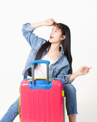 Traveler tourist woman in summer casual clothes.Asian Smiling woman wearing sun glasses.Passenger traveling abroad to travel on white background.