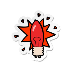 sticker of a cartoon red light bulb