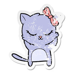 distressed sticker of a cute cartoon cat with bow