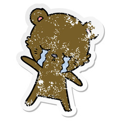 distressed sticker of a crying cartoon bear