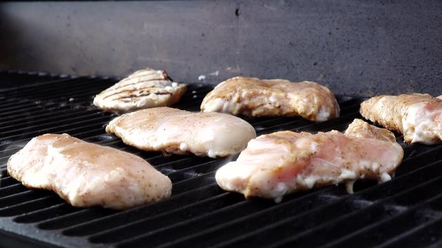 DGS 2019_03_12 Flipping Chicken on Barbeque