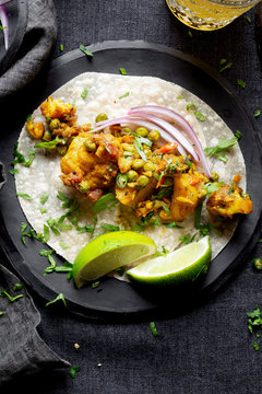 Indian Vegan Dinner - Aloo Gobi (Cauliflower, and potato) and Roti.