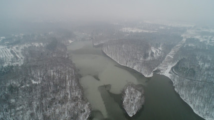 An aerial view of Lake Needwood in Rockville on a snowy day