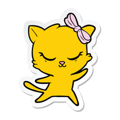 sticker of a cute cartoon cat with bow