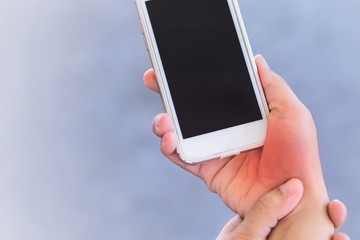 Pain in the palm area , Because holding the phone for a long time.
