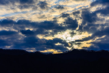 a strong cloud and sunset