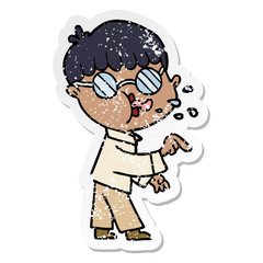 distressed sticker of a cartoon boy wearing spectacles and making point