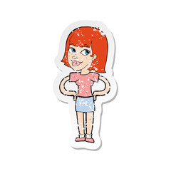 retro distressed sticker of a cartoon happy woman with hands on hips