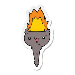 sticker of a cartoon flaming chalice