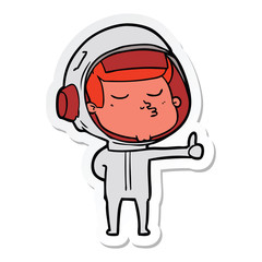 sticker of a cartoon confident astronaut giving thumbs up sign
