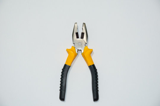 Grip pliers with yellow and black.
