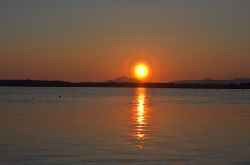 涸沼の夕景　花粉光環 © tomo