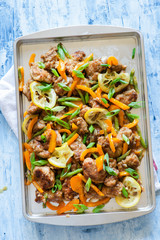 Chicken stir fry with peppers, green beans, lemons