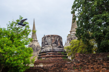 Ancient old pagoda of buddhist temple statue
