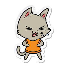 sticker of a cartoon cat hissing
