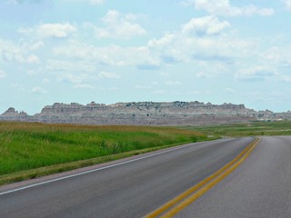 Fototapeta na wymiar Paved roads around the loop of Badlands National Park in South Dakota makes it accessible for visitors.