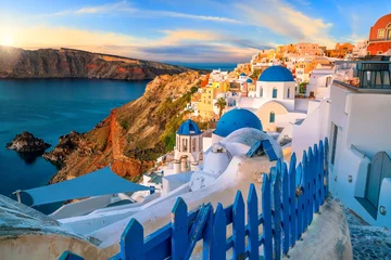 Tuinposter Sunset on the famous Oia city, Greece, Europe © f11photo