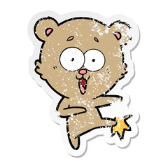 distressed sticker of a laughing teddy  bear cartoon