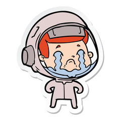 sticker of a cartoon crying astronaut