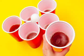 Cups for game Beer Pong on the table