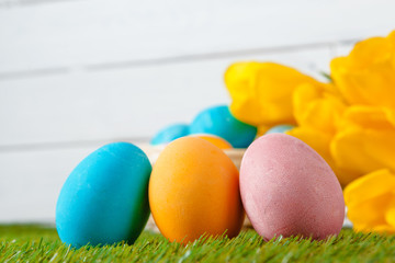 Easter Eggs with flower on Green Grass