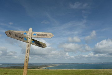 Sign on path above Old Harry Rocks on Dorset coast