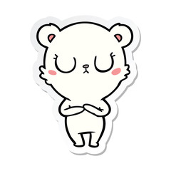 sticker of a peaceful cartoon polar bear