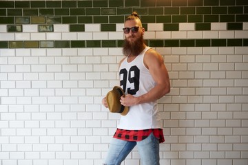 Street portrait of young bearded man