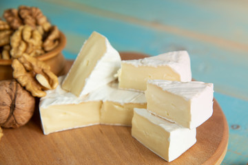 Cheese camembert or brie with walnut kernels