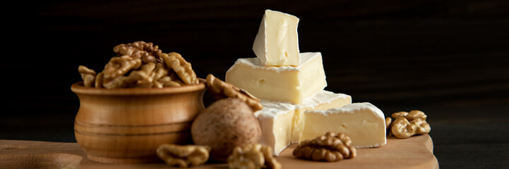 Cheese camembert or brie with walnut kernels