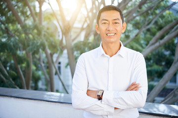 Mature man standing outdoors